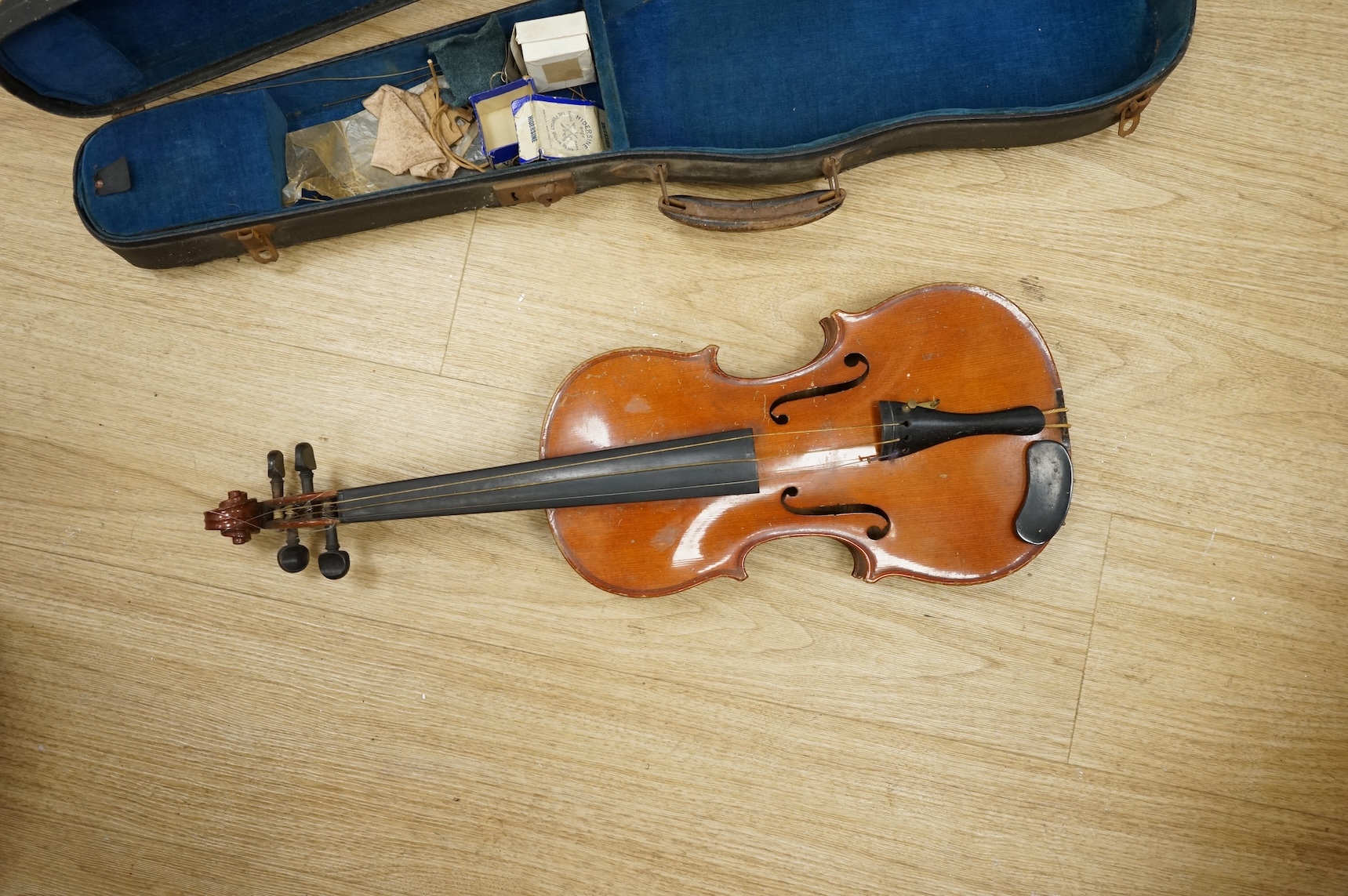 An early 20th century German violin, bearing a Stradivarius label, with case.
